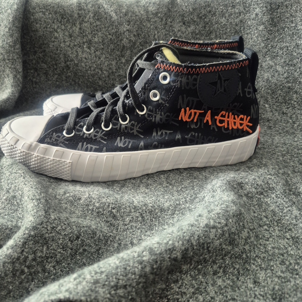 Converse Black and White High-Tops with Orange Details
